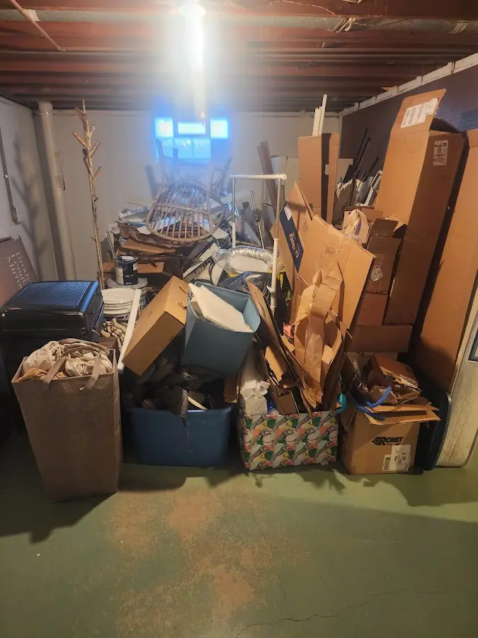 Roll-off dumpster container at job site for 4 Yard Dumpster Rental in St. Thomas